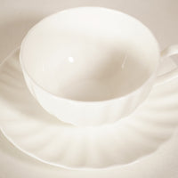 Tasse fine porcelaine blanche