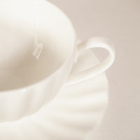 Tasse fine porcelaine blanche